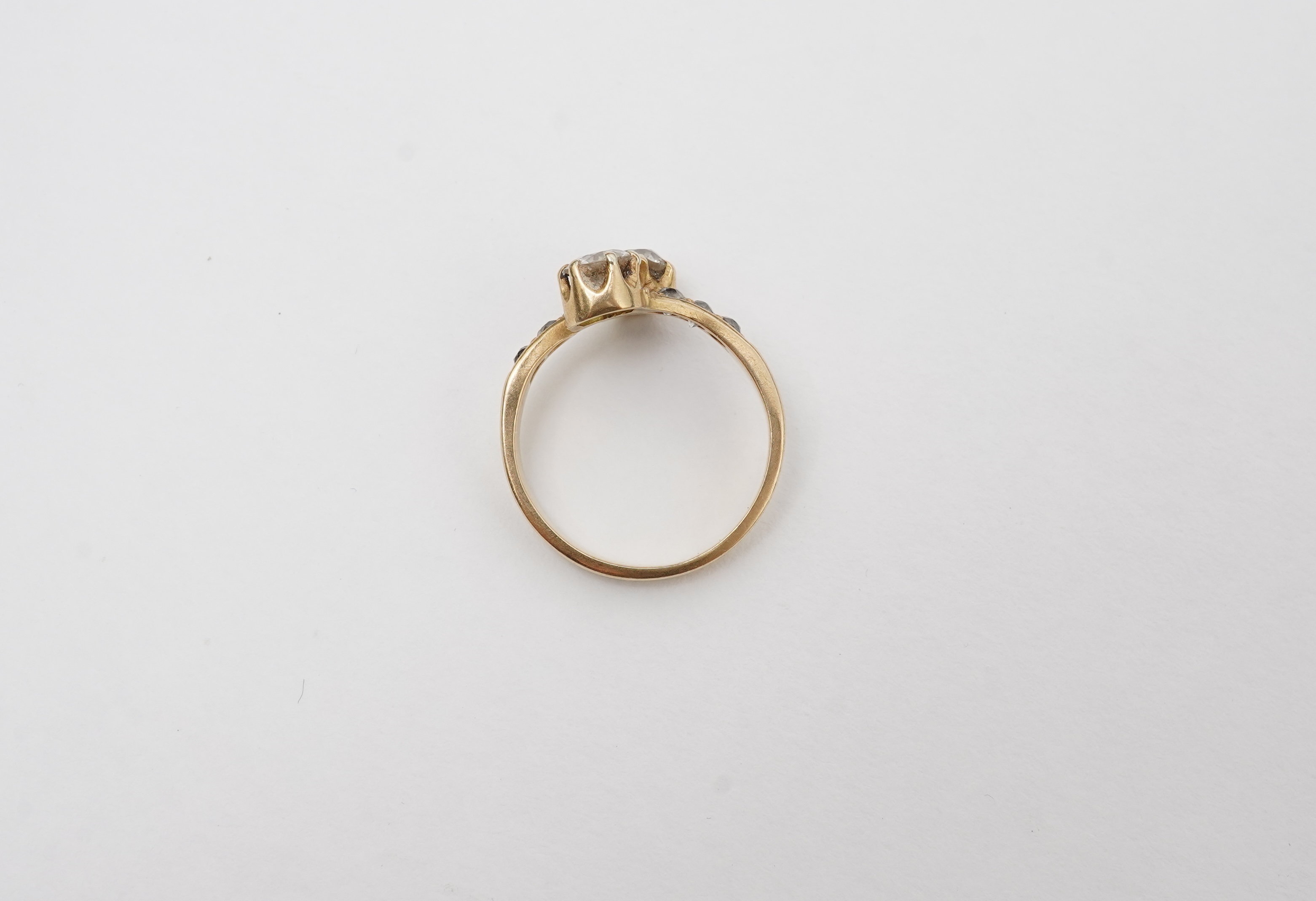 A gold and diamond 'toi-et-moi' ring, circa 1900